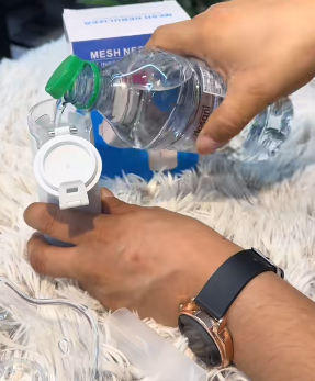 Customer using Portable Nebulizer - Congestion Eliminator